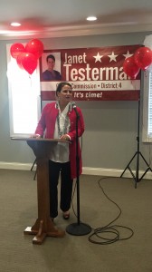 Janet Testerman speaking to those attendees about the next 6 months and about dollars and doors. There is something for everyone, contribute dollars and/or knock on doors. 