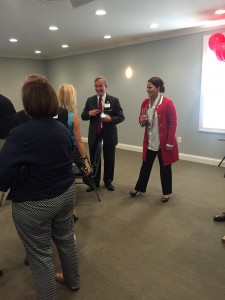 Mrs. and Commissioner Bob Thomas visit with Testerman just before she speaks to the crowd.