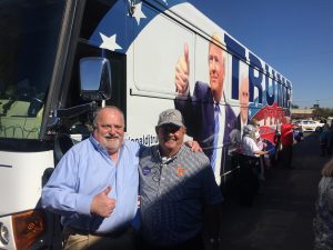 Friends Walt Wojnar and Dan Raper with the Trump bus. 