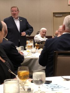 Russ Jensen of Knoxville 311 introduces himself as Former Knoxville Mayor Randy Tyree listens 